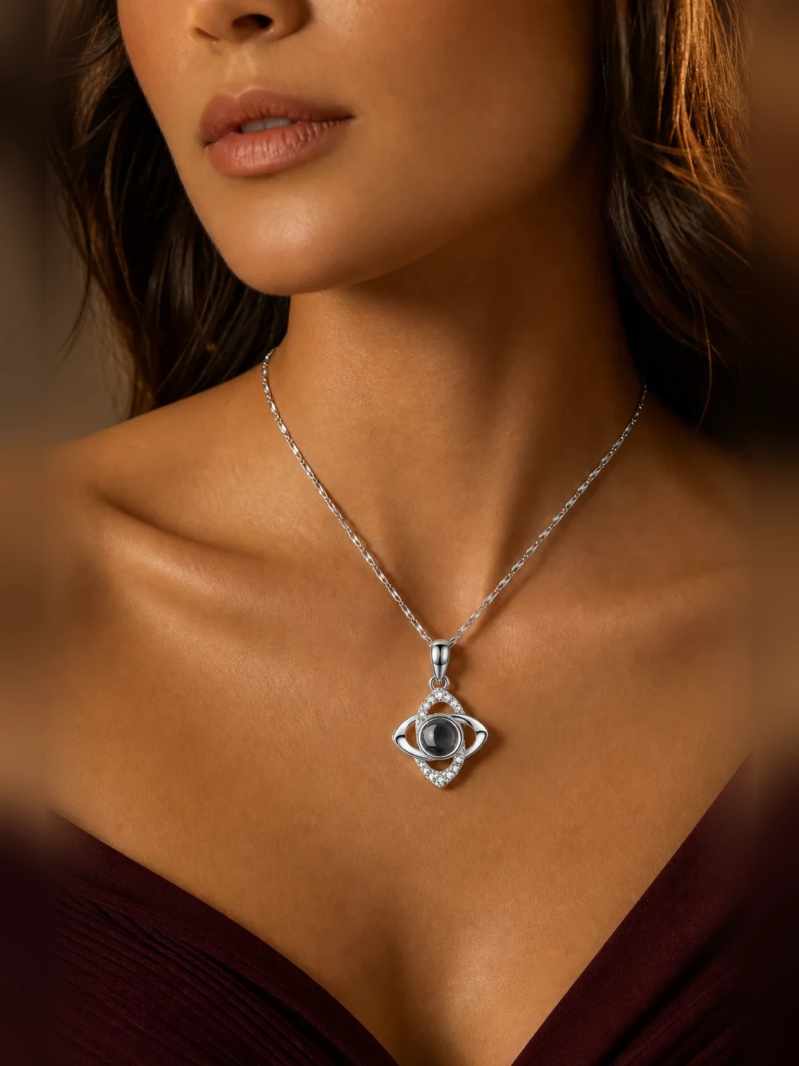 Four Leaf Clover Photo Projection Necklace shown as worn