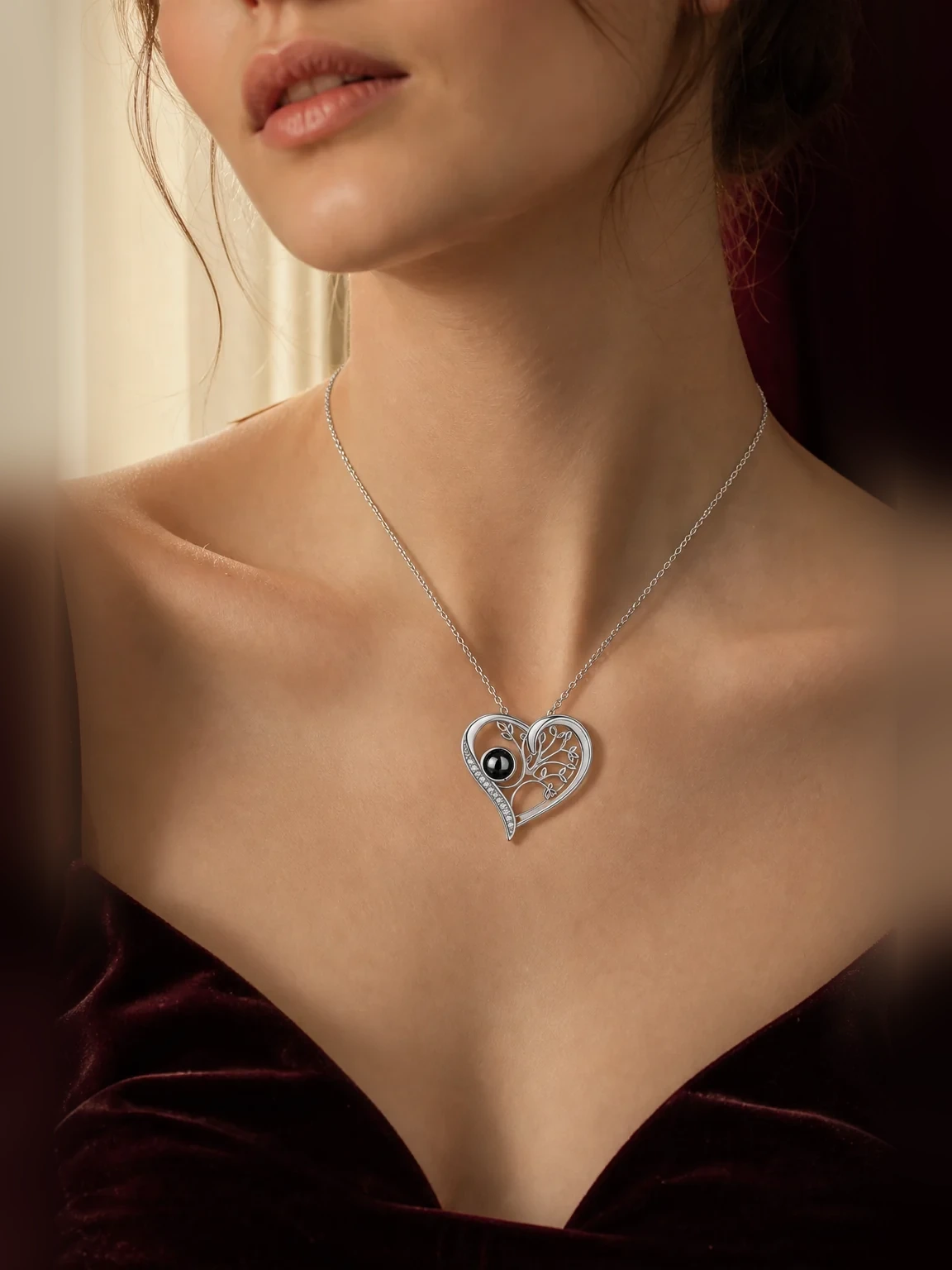 Life Tree Projection Necklace shown as worn