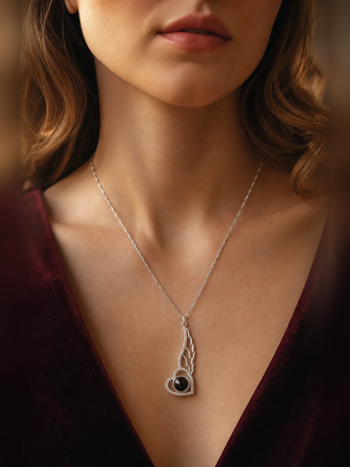 Personalized Pavé Angel Wing Photo Necklace shown as worn