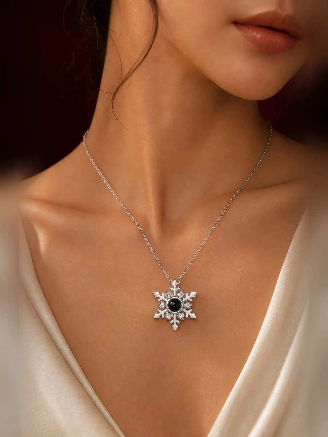 Snowflake Projection Necklace shown as worn